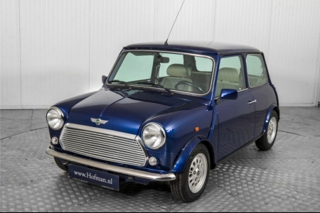 MINI 1.3 MPi Cooper maar 24489 km!  thumbnail 17