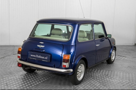 MINI 1.3 MPi Cooper maar 24489 km!  thumbnail 26