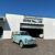 De baby blauwe Morris Minor Traveller